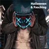 A person holding a glowing LED mask. Produktbild-Vorschau