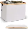 A laundry basket filled with clothes, with a separate lid shown below. Produktbild-Vorschau