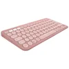 A pink wireless keyboard and mouse combo is shown from a side angle on a white background. Produktbild-Vorschau