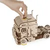 A hand is shown turning a knob on a wooden model truck. Produktbild-Vorschau