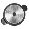 The underside of a pressure cooker with a textured metallic surface. Podgląd zdjęcia produktu