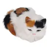 A plush toy cat is shown from a slightly elevated front view against a white background. Náhľad obrázku produktu