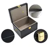An open black box with gold clasps, showing its interior lining and close-ups of the material and clasp. Produktbild-Vorschau