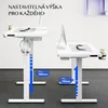 Two white adjustable height desks shown in a modern office setting. Náhled obrázku produktu