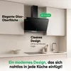 A modern kitchen setting with a black range hood installed above a countertop. Anteprima dell’immagine prodotto