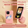 A pink toy smartphone with a unicorn design on the back and a picture of two children on the screen, presented with descriptive text. Produktbild-Vorschau