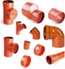 A collection of various orange plastic pipes and fittings arranged on a white background. Produktbild-Vorschau