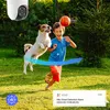 A child and a dog playing in a garden, with a security camera in the corner and a notification overlay. Produktbild-Vorschau