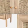 Collage of close-up shots of a wooden bookshelf with rattan detailing. Produktbild-Vorschau