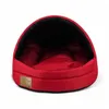 A red dog bed with a black interior, shown from the front. Anteprima dell’immagine prodotto