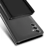 A close-up, angled view of a black flip case for a smartphone, showing the camera module on the back of the phone. Produktbild-Vorschau