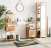 A bathroom scene with bamboo shelving units, a sink, mirror, and a green trash can. Podgląd zdjęcia produktu