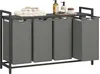 A laundry sorter with four compartments and a shelf on top, holding towels and toiletries. Produktbild-Vorschau
