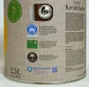 Close-up of a paint can showing various certifications and product information. Produktbild-Vorschau