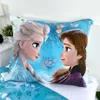 A close-up shot of a pillow with characters from Frozen on it, placed on a bed. Produktbild-Vorschau