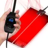 A hand holding a thermostat controller for a red heating mat. Anteprima dell’immagine prodotto
