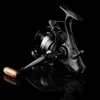A black fishing reel with a wooden handle is shown against a black background with its reflection. Podgląd zdjęcia produktu