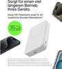 A product image featuring a white power bank and a black smartphone, with text highlighting product features. Voir les images du produit