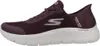 Side view of a burgundy Skechers slip-in sneaker with a white sole. Anteprima dell’immagine prodotto