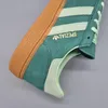 A close-up view of an Adidas Handball Spezial sneaker. Produktbild-Vorschau