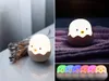 A collage of images showing a cute egg-shaped night light with a chick inside, in various colors and settings. Produktbild-Vorschau