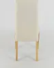 The back view of a dining chair with an ivory upholstered seat and back, and natural wood legs. Voir les images du produit