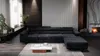 A modern living room with a large sectional sofa, coffee table, and fireplace. Produktbild-Vorschau