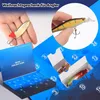 A Christmas advent calendar for anglers, showing fishing lures inside. Produktbild-Vorschau