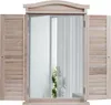 A wooden framed mirror with shutters, reflecting a room with white curtains and a plant. Podgląd zdjęcia produktu