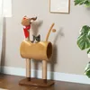 A cat sits in a reindeer-themed cat tree. Produktbild-Vorschau