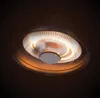 A close-up, low-angle shot of a ceiling-mounted heater with glowing heating elements. Produktbild-Vorschau