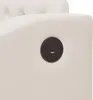 A close-up view of a beige upholstered sofa with a built-in charging port. Náhľad obrázku produktu