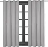Two light gray curtains are shown hanging in front of a window with dark wooden frames. Produktbild-Vorschau