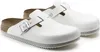 A pair of white BIRKENSTOCK Boston Super Grip clogs are shown from a slightly elevated side angle against a white background. Produktbild-Vorschau