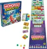 Monopoly Knockout board game box and components laid out on a white background. Voir les images du produit