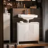 A modern bathroom vanity with a sink and cabinet, featuring a textured design. Voir les images du produit