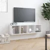 A white wall-mounted TV cabinet with a TV mounted above it. Voir les images du produit