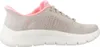 A side view of a single athletic shoe. Voir les images du produit