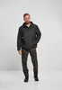 A man is standing and posing for a product image. Produktbild-Vorschau
