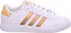 A white Adidas sneaker with gold stripes and accents, shown from the side against a white background. Produktbild-Vorschau