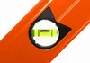 A close-up shot of the bubble level on an orange spirit level. Anteprima dell’immagine prodotto