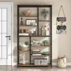 A tall, multi-shelf bookcase filled with decorative items and books, placed next to a white door in a room. Podgląd zdjęcia produktu