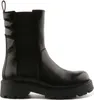 A black leather Chelsea boot with a thick sole, shown from the side against a white background. Anteprima dell’immagine prodotto