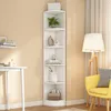 A white corner bookshelf with decorative items on a light beige wall. Produktbild-Vorschau