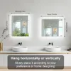 Two illuminated mirrors are shown above sinks in a bathroom setting. Anteprima dell’immagine prodotto
