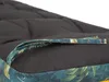 A close-up view of a cushion or mattress with a patterned fabric edge and a fabric loop. Náhled obrázku produktu