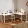 A modern white L-shaped desk in a home office setting, with a computer, chair, and decorative items. Produktbild-Vorschau
