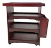A dark brown wooden side table with four shelves and a magazine rack on the side. Produktbild-Vorschau