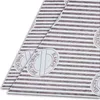 Two flat grease filters for a range hood, laid diagonally on a white background. Podgląd zdjęcia produktu