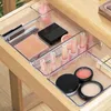 A drawer filled with makeup and organizers. Náhled obrázku produktu